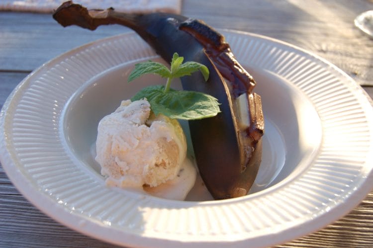Grilled banana with melted chocolate and ice cream Grilled banana with melted chocolate and ice cream
