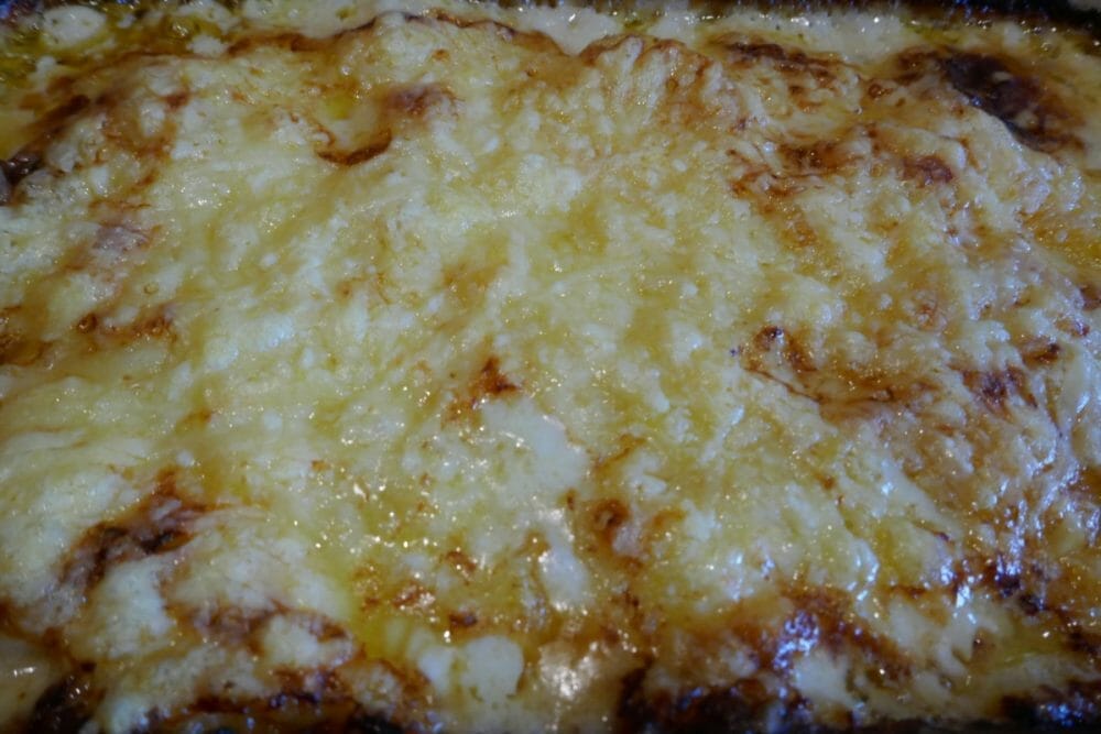 Fløtegratinerte poteter med løk