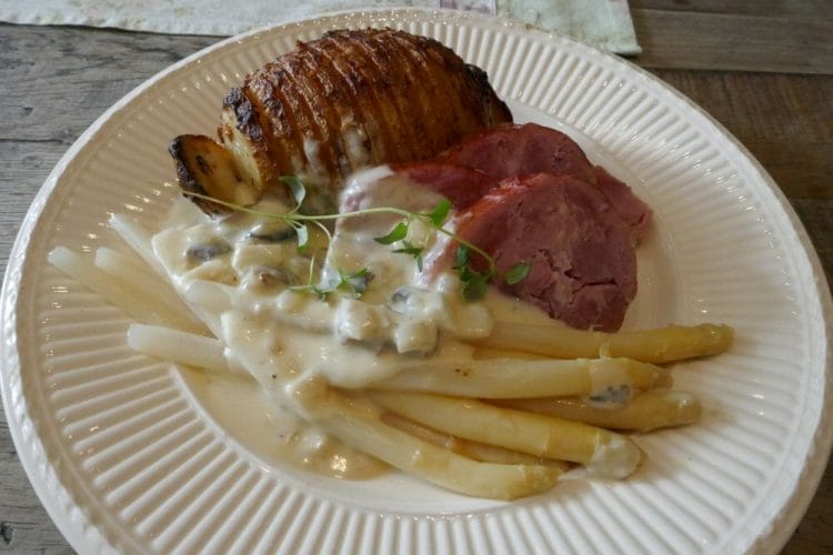 Bayonne ham with asparagus sauce and hasselback potatoes