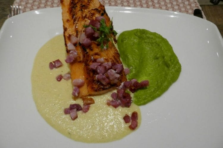 Salmon with apple and fennel sauce, pea puree and bacon