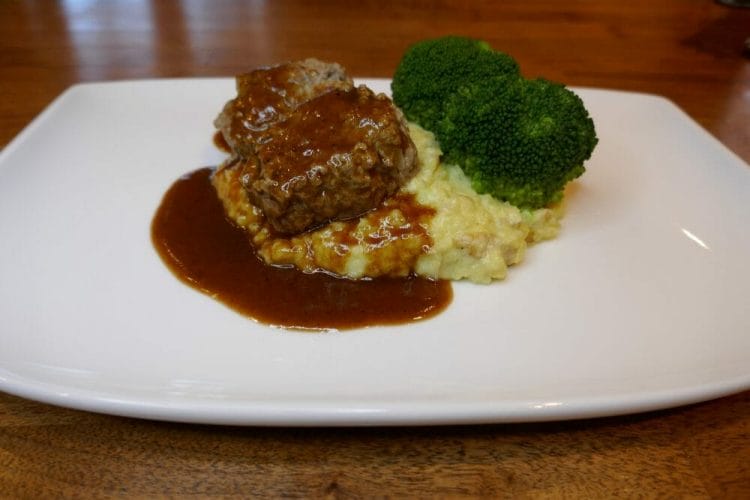 Meatballs with mashed potatoes and brown sauce