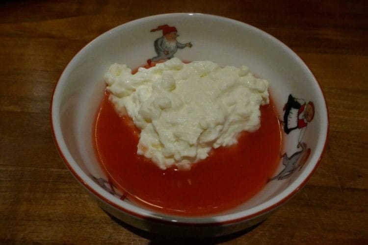 Rice cream with strawberry sauce
