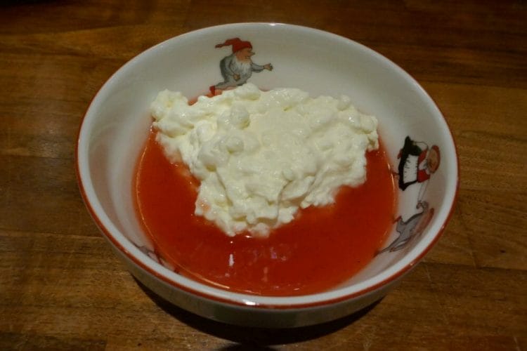 Rice cream with strawberry sauce