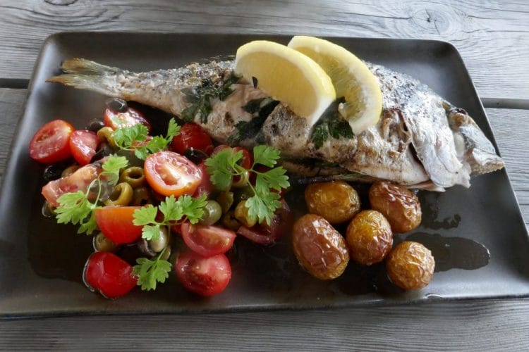 Sea bream with Mediterranean side dishes
