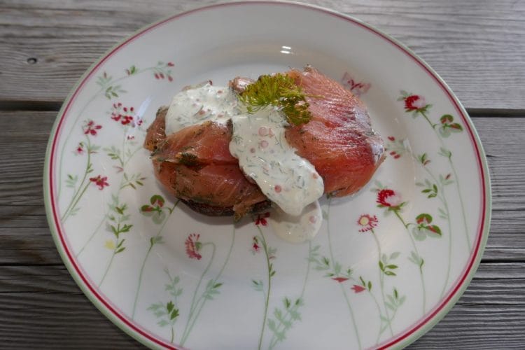 Baked potato with gravlax and cold sour cream sauce Baked potato with gravlax and cold sour cream sauce